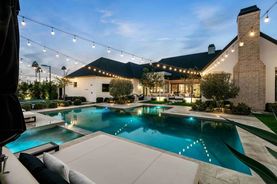 Arizona pool and outdoor living project illuminated for evening use